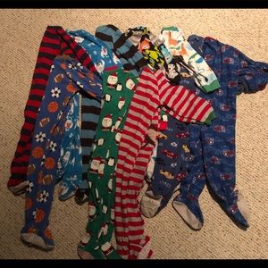 10 pair of Carter’s fleece footed PJ’s